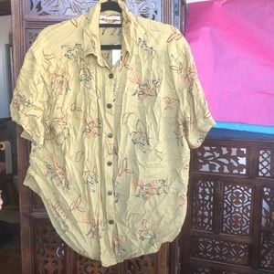 Collared button up short sleeve patterned shirt